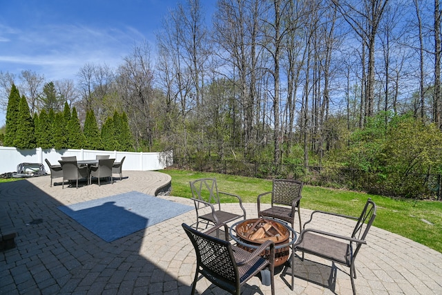 51466 Promenade Ln, New Baltimore, MI 48047 - view of patio with a fire pit and outdoor dining area