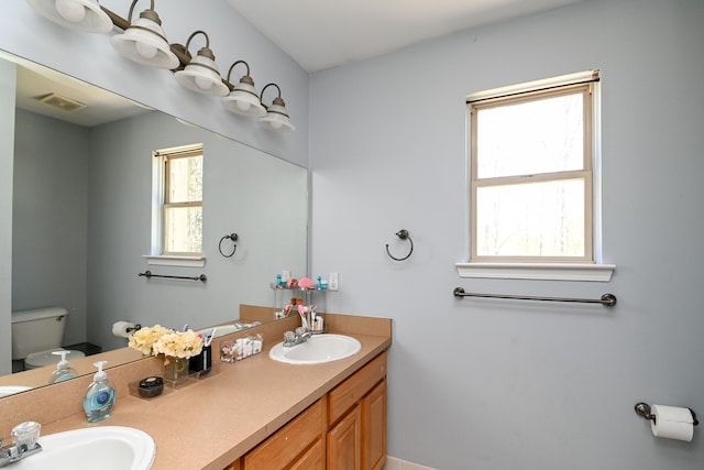 51466 Promenade Ln, New Baltimore, MI 48047 - bathroom featuring toilet and double vanity