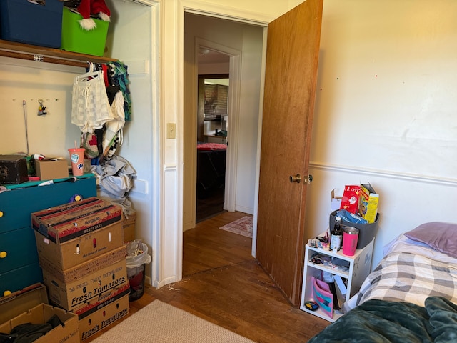 bedroom featuring wood finished floors