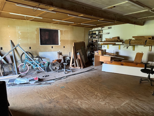 basement with a workshop area