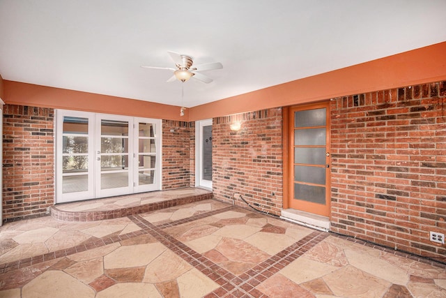 view of patio with ceiling fan and french doors