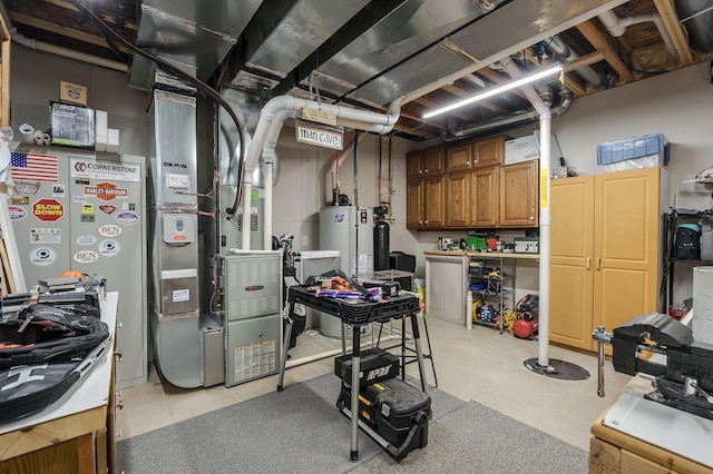 utility room featuring heating unit and gas water heater