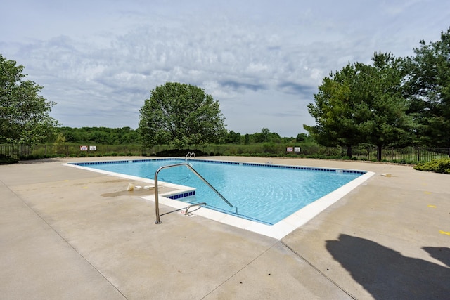 2371 Hollow Creek Trl, Portage, MI 49024 - pool with a patio and fence
