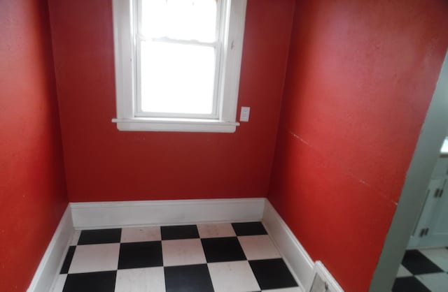 spare room featuring tile patterned floors