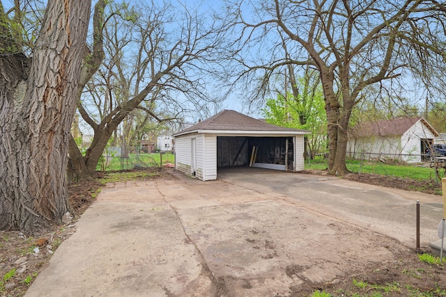 detached garage with fence