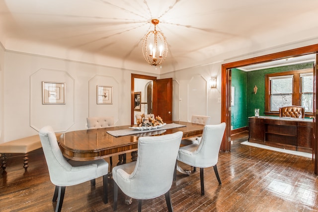 16924 Muirland St, Detroit, MI 48221 - dining space with a notable chandelier and dark wood-style floors