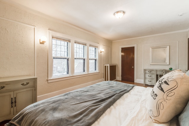16924 Muirland St, Detroit, MI 48221 - bedroom featuring baseboards, ornamental molding, and a textured wall