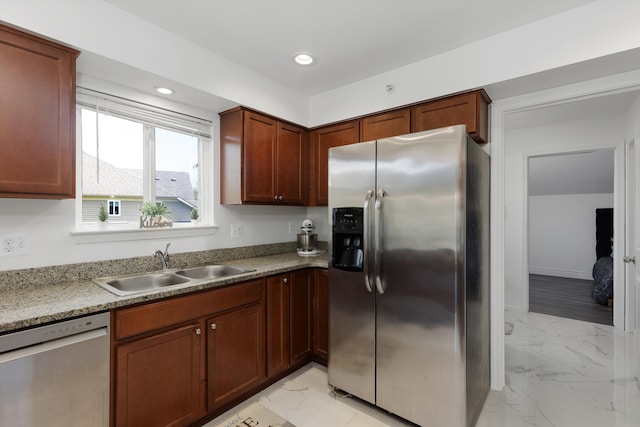 kitchen with recessed lighting, a sink, marble finish floor, and appliances with stainless steel finishes