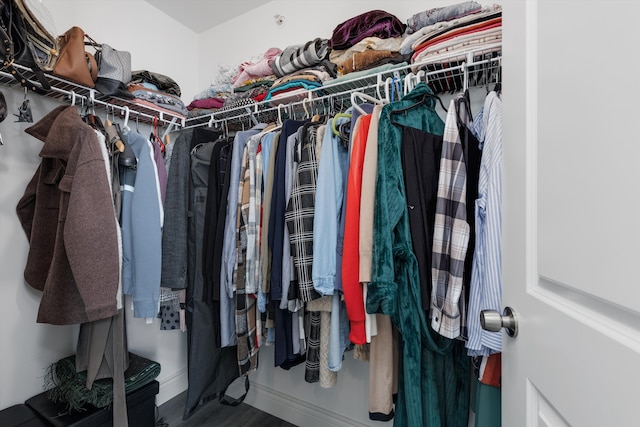 spacious closet featuring wood finished floors