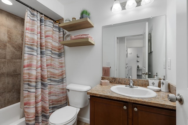 full bath with toilet, shower / bath combo, and vanity