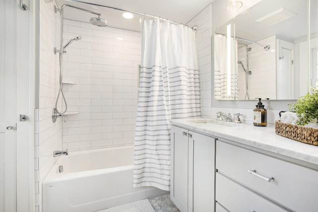 906 Granger Ave, Ann Arbor, MI 48104 - bathroom featuring vanity, tile patterned floors, and shower / tub combo