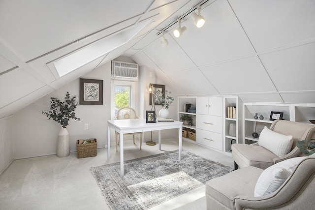 906 Granger Ave, Ann Arbor, MI 48104 - office space with vaulted ceiling with skylight, a wall mounted AC, rail lighting, built in shelves, and carpet floors