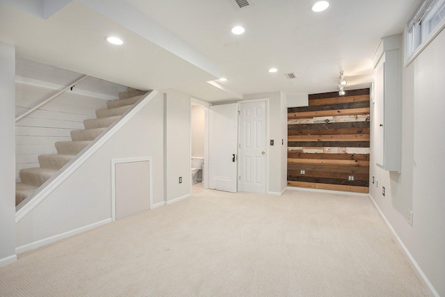 906 Granger Ave, Ann Arbor, MI 48104 - finished basement with recessed lighting, wood walls, stairs, and carpet