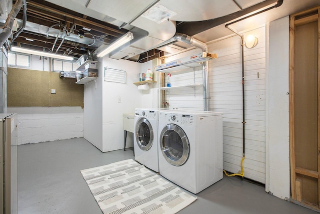 906 Granger Ave, Ann Arbor, MI 48104 - laundry room featuring separate washer and dryer and laundry area
