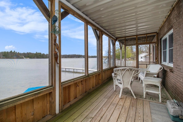 sunroom with a water view