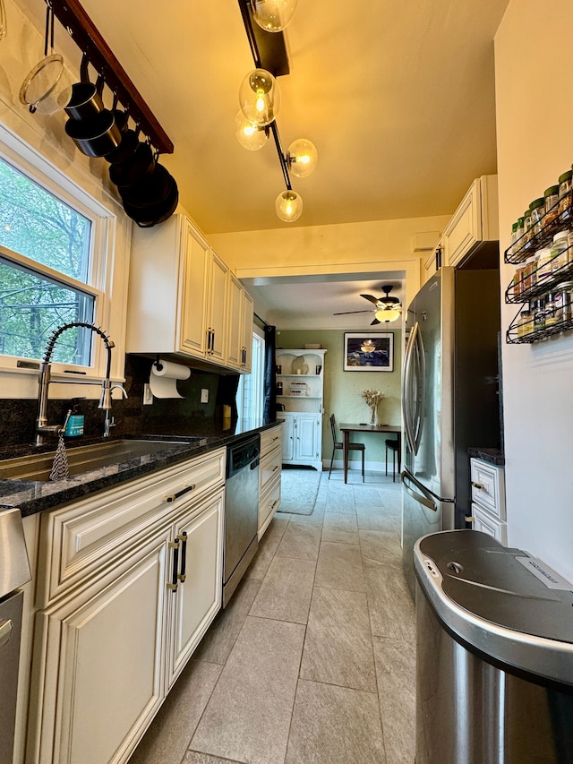 2361 Montroyal Ave, Waterford, MI 48328 - kitchen with ceiling fan, appliances with stainless steel finishes, plenty of natural light, and a sink
