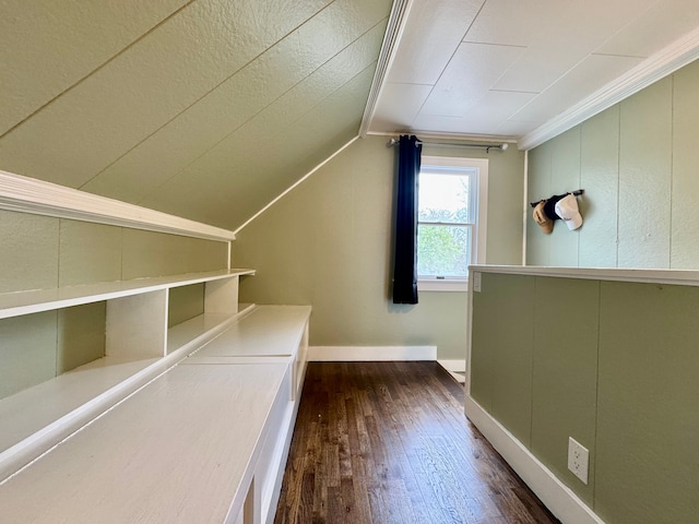 2361 Montroyal Ave, Waterford, MI 48328 - additional living space with baseboards, lofted ceiling, and dark wood-type flooring