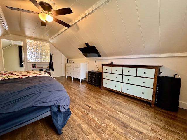 2361 Montroyal Ave, Waterford, MI 48328 - bedroom with crown molding, vaulted ceiling, and wood finished floors