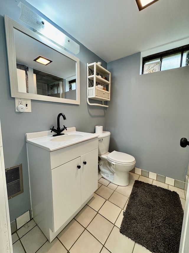 2361 Montroyal Ave, Waterford, MI 48328 - bathroom with vanity, tile patterned flooring, toilet, and visible vents