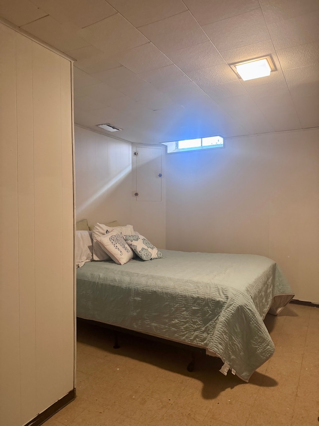 bedroom with tile patterned floors