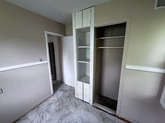 closet featuring visible vents