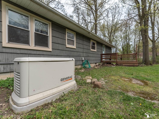 view of side of home featuring a lawn