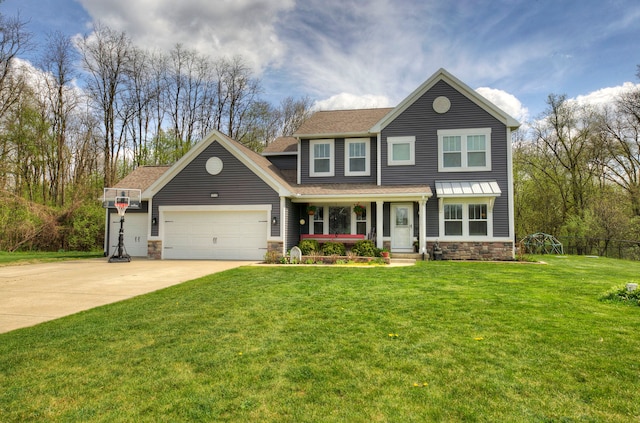 view of front of home with stone siding, a garage, a front yard, concrete driveway, and covered porch