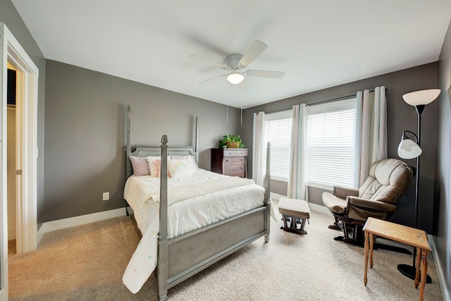 bedroom featuring baseboards, carpet, and ceiling fan