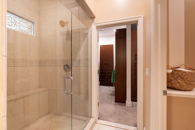 full bathroom featuring a shower stall