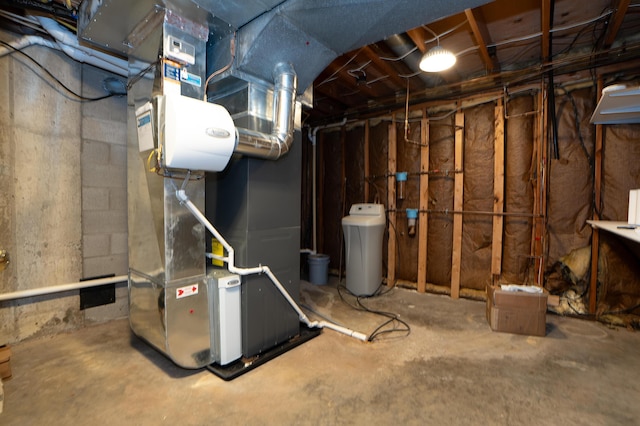 unfinished below grade area featuring heating unit