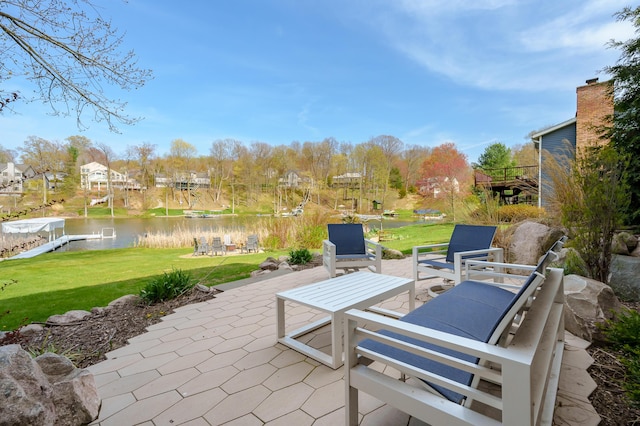 view of patio / terrace with a water view