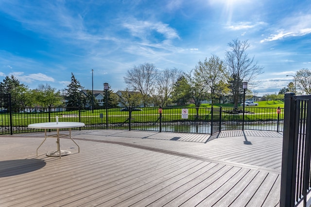 deck featuring a lawn