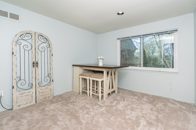 interior space with visible vents and baseboards