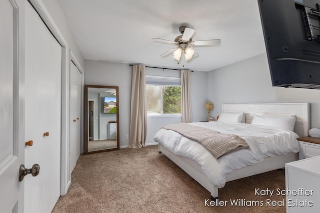bedroom featuring baseboards and light carpet