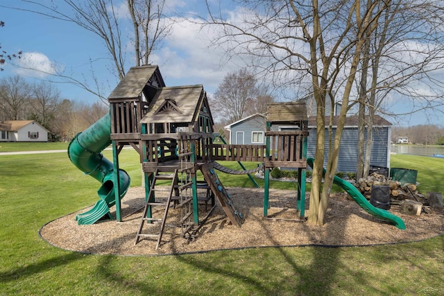community jungle gym featuring a lawn and a water view