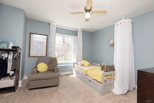 bedroom with baseboards, carpet, and a ceiling fan