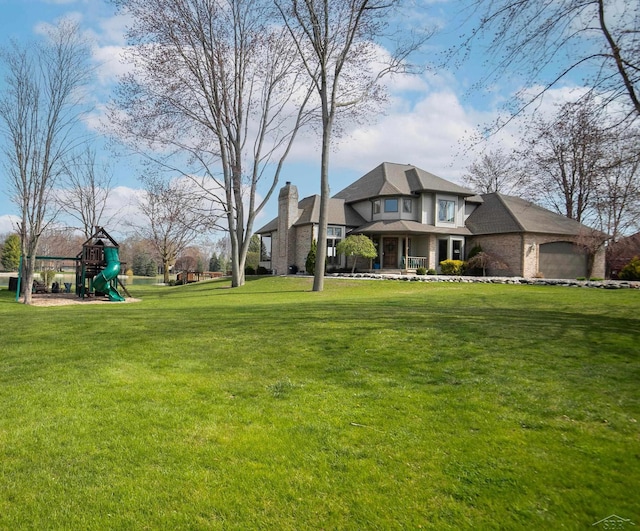 view of yard with a porch and playground community