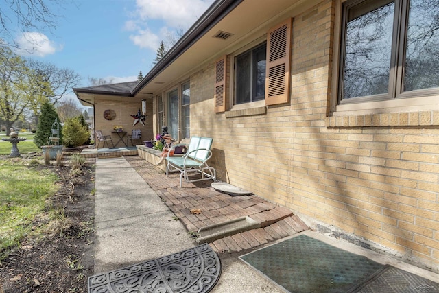 view of patio / terrace featuring visible vents