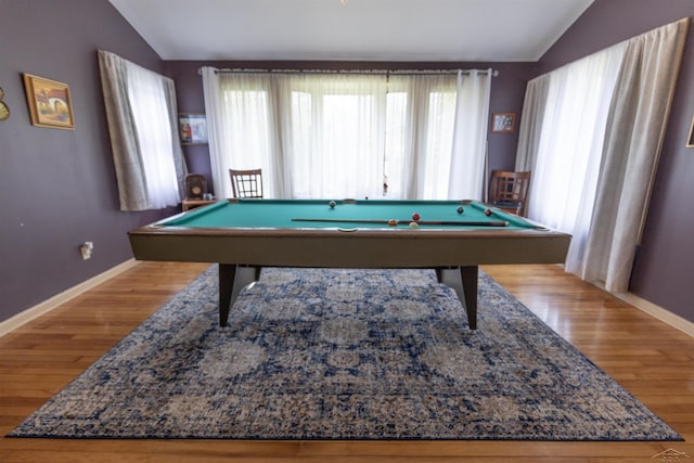 rec room featuring wood finished floors, baseboards, lofted ceiling, and pool table