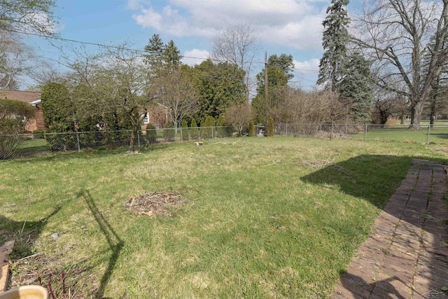 view of yard with a fenced backyard