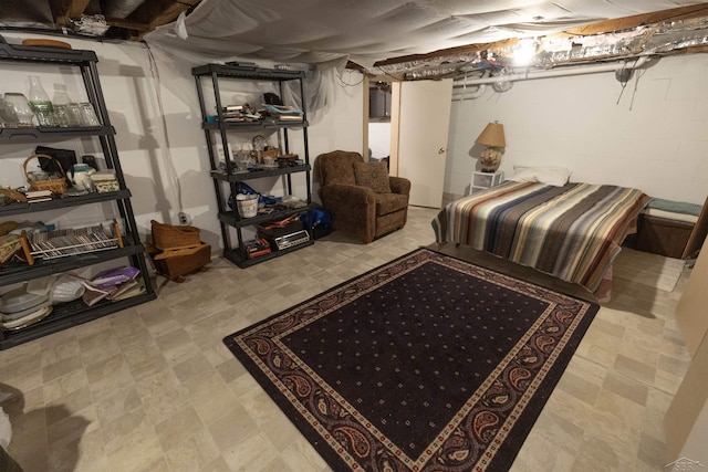 finished basement featuring tile patterned floors