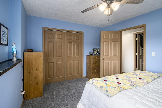 1077 Sun Valley Ln, Allegan, MI 49010 - carpeted bedroom with a textured ceiling, ceiling fan, and a closet