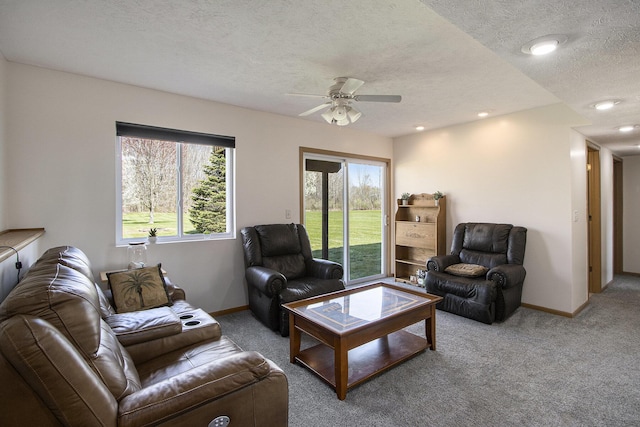 1077 Sun Valley Ln, Allegan, MI 49010 - carpeted living room with baseboards, recessed lighting, a textured ceiling, and ceiling fan