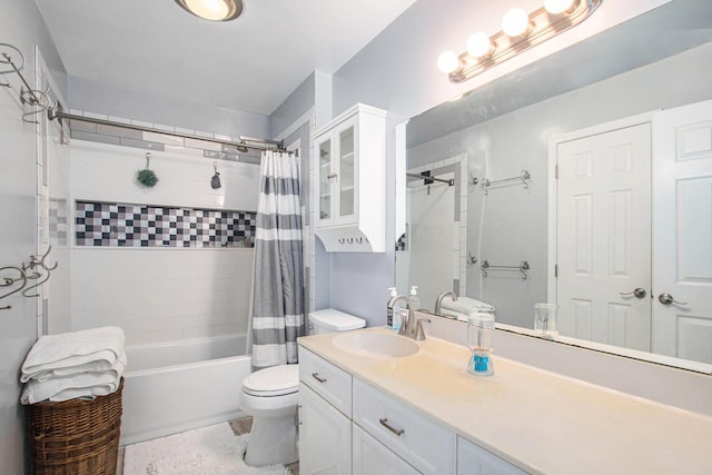 full bathroom with vanity, shower / bathtub combination with curtain, and toilet