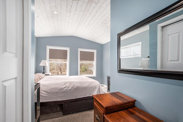 bedroom with vaulted ceiling and wooden ceiling