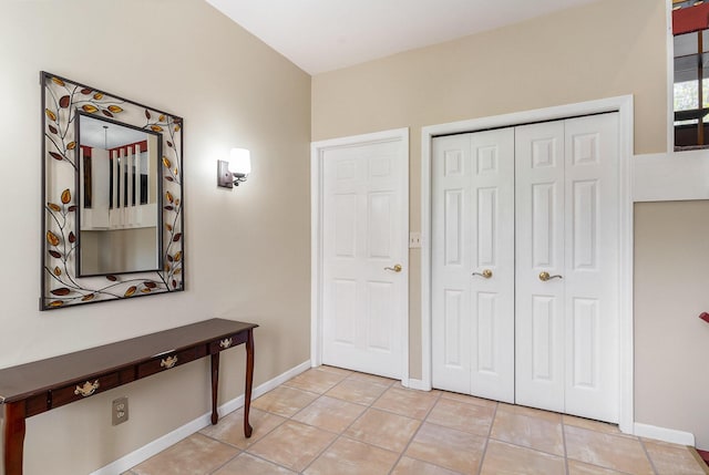 17653 Hiawatha Dr, Spring Lake, MI 49456 - hall with baseboards and light tile patterned flooring