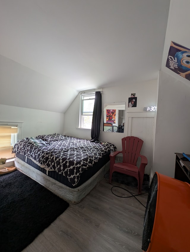 162 Perkins St, Pontiac, MI 48342 - bedroom with wood finished floors and vaulted ceiling