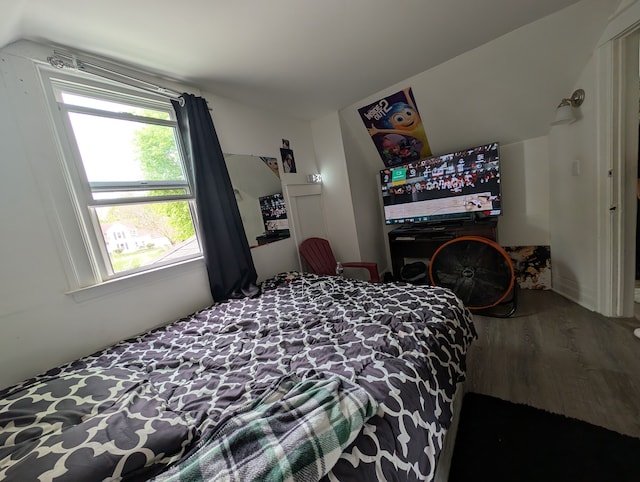 162 Perkins St, Pontiac, MI 48342 - bedroom featuring wood finished floors and vaulted ceiling