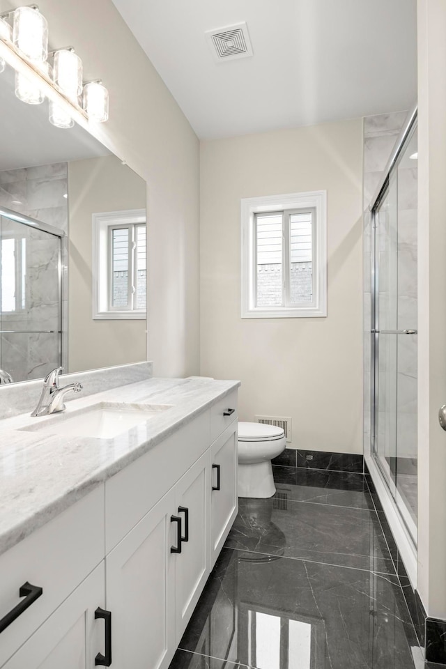 1685 E Wattles Rd, Troy, MI 48085 - bathroom featuring toilet, a shower stall, and visible vents