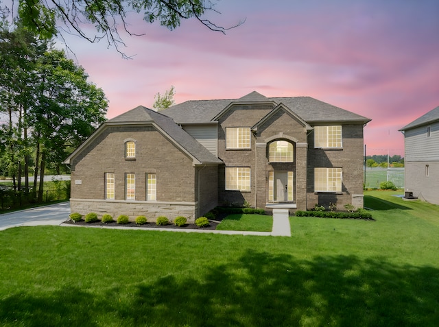1685 E Wattles Rd, Troy, MI 48085 - view of front of home featuring brick siding and a front yard